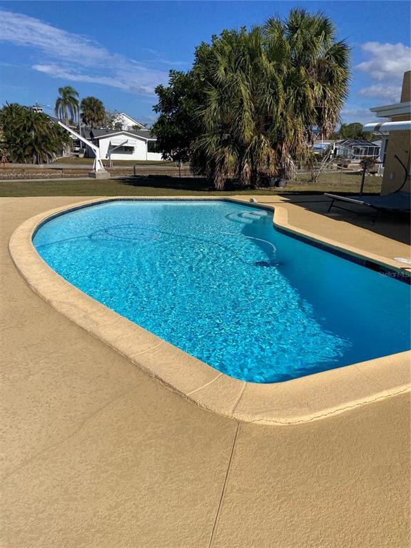 5343 Bluepoint Drive Port Richey, FL 34668 - Photo 5 of 28 a view of outdoor space and swimming pool