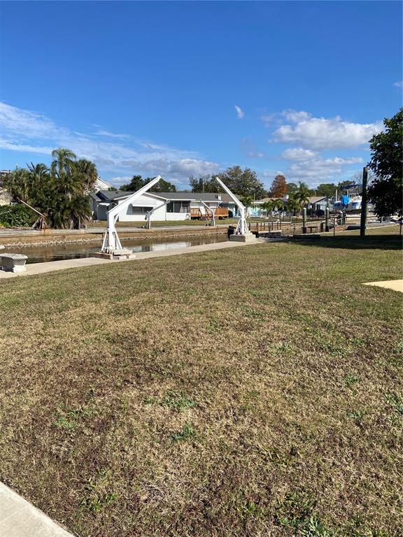 5343 Bluepoint Drive Port Richey, FL 34668 - Photo 7 of 28 a front view of a house with a ocean view