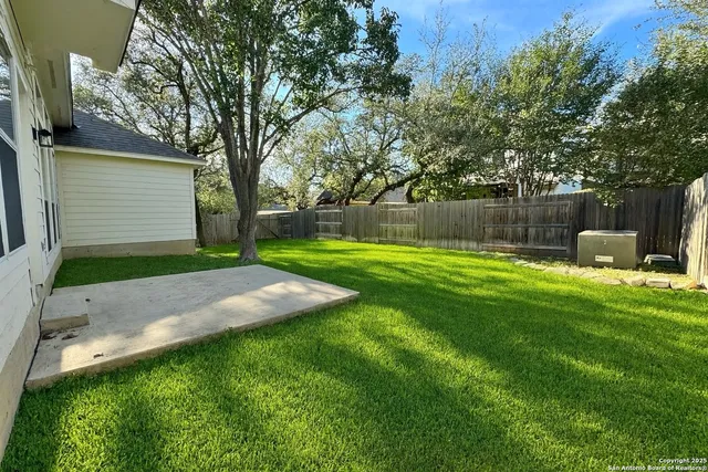 a view of a backyard with a garden