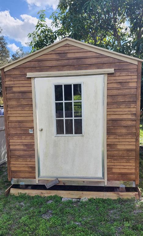 3248 Timberline Road Winter Haven, FL 33880 - Photo 16 of 23 SHED THAT STAYS WITH THE PROPERTY