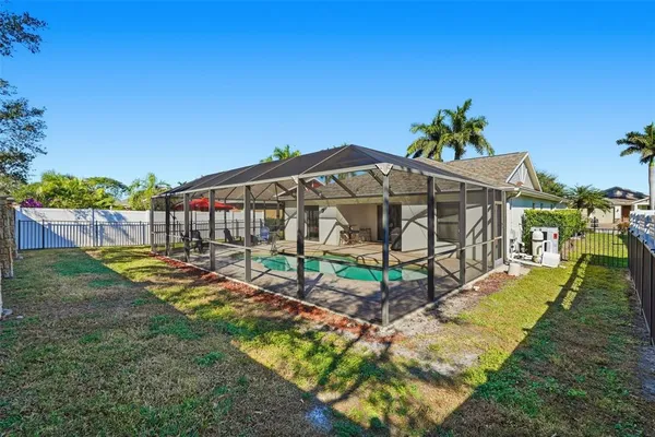 a view of a backyard with a garden and plants
