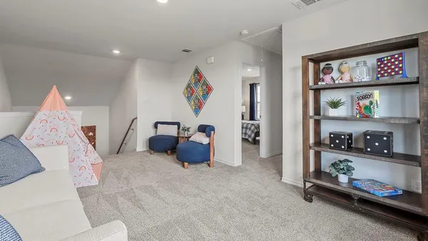 a view of a livingroom with furniture
