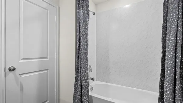 a bathroom with a bathtub
