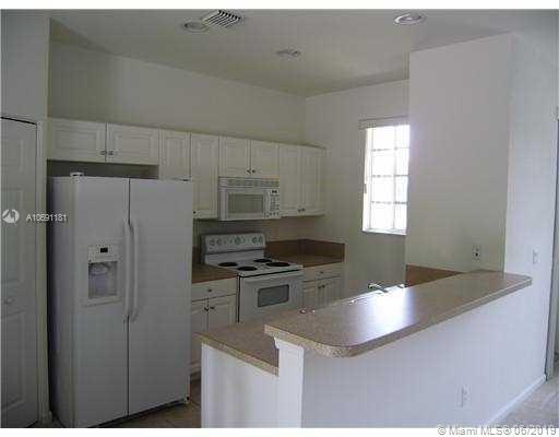 958 Tortuga Lane Riviera Beach, FL 33404 - Photo 7 of 8 Gallery Image 7