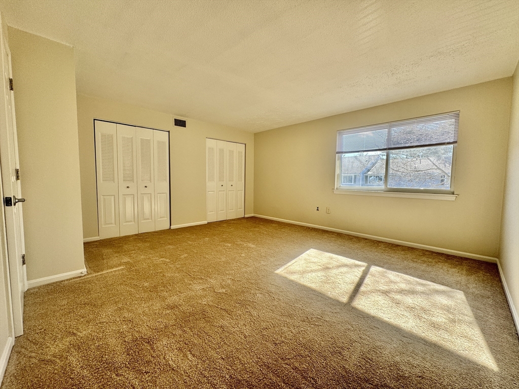 13 Beal's Cove Road, Unit E Hingham, MA 02043 - Photo 16 of 20 a view of an empty room