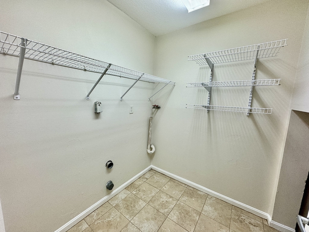 13 Beal's Cove Road, Unit E Hingham, MA 02043 - Photo 18 of 20 a bathroom with a shower