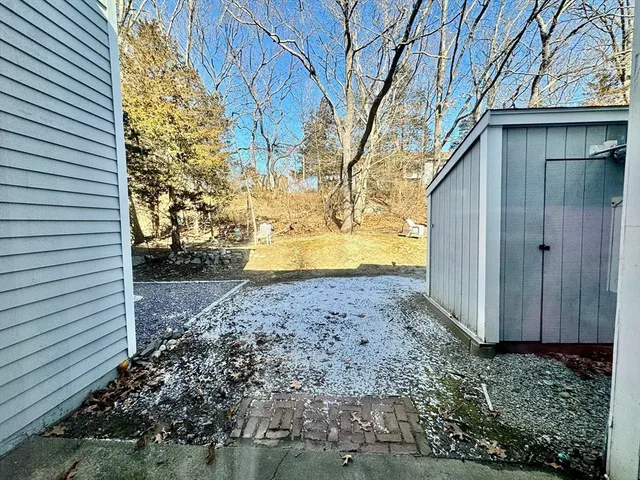 a view of a back yard of the house