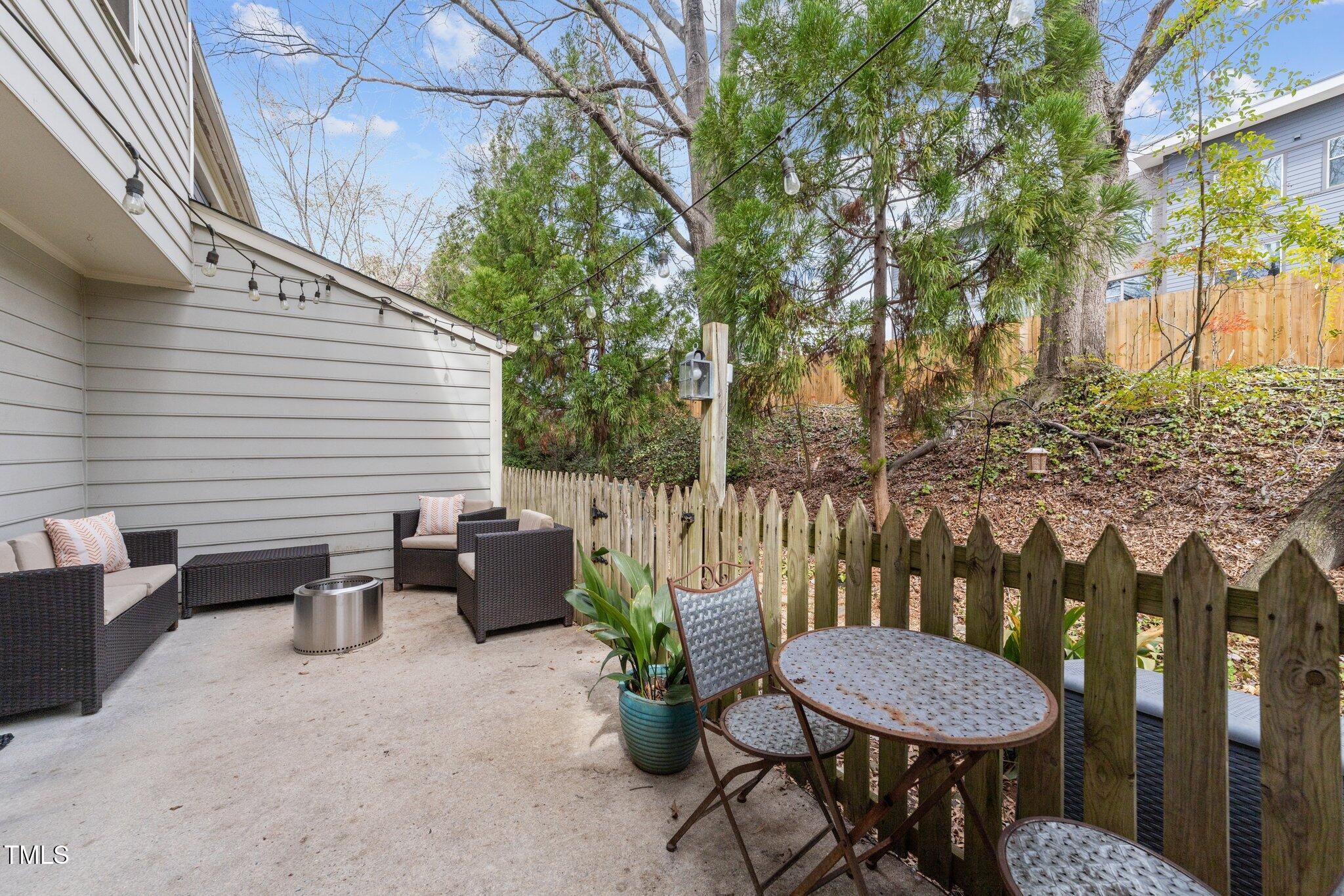 1334 Baez Street Raleigh, NC 27608 - Photo 11 of 28 a view of a chairs and table in the patio