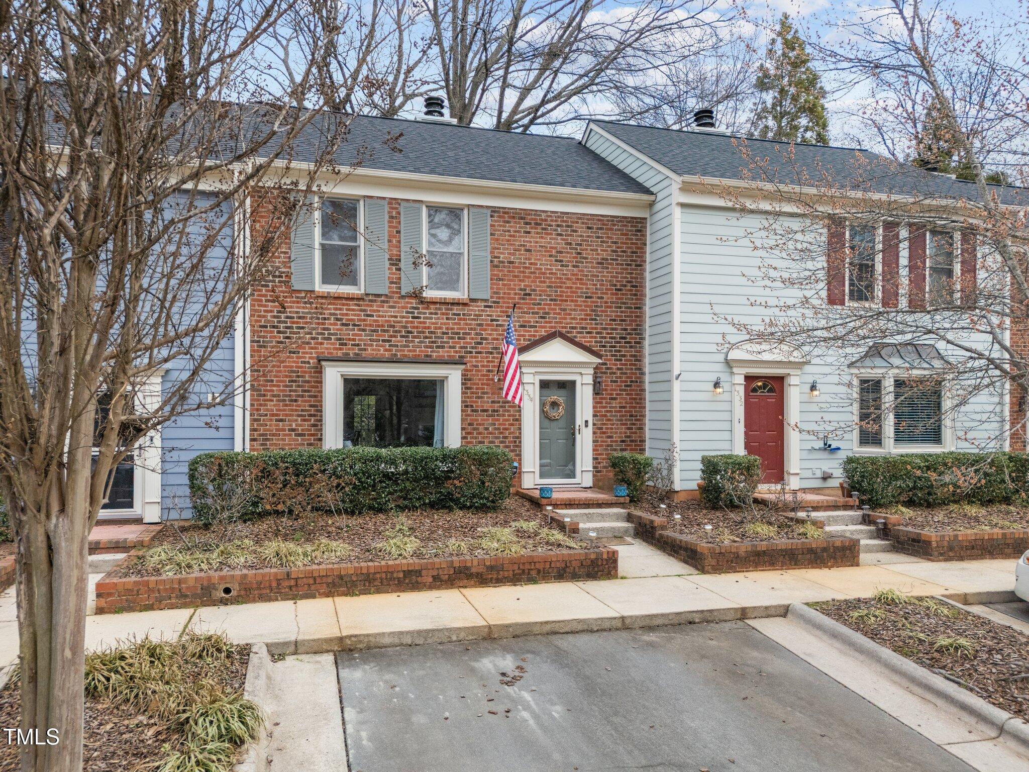 1334 Baez Street Raleigh, NC 27608 - Photo 25 of 28 a front view of a house with yard