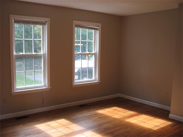 579 Old Warren Road Palmer, MA 01069 - Photo 4 of 27 an empty room with a window