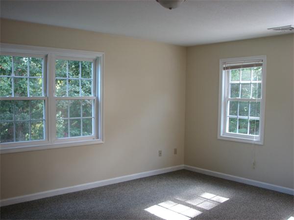 579 Old Warren Road Palmer, MA 01069 - Photo 10 of 27 an empty room with a window
