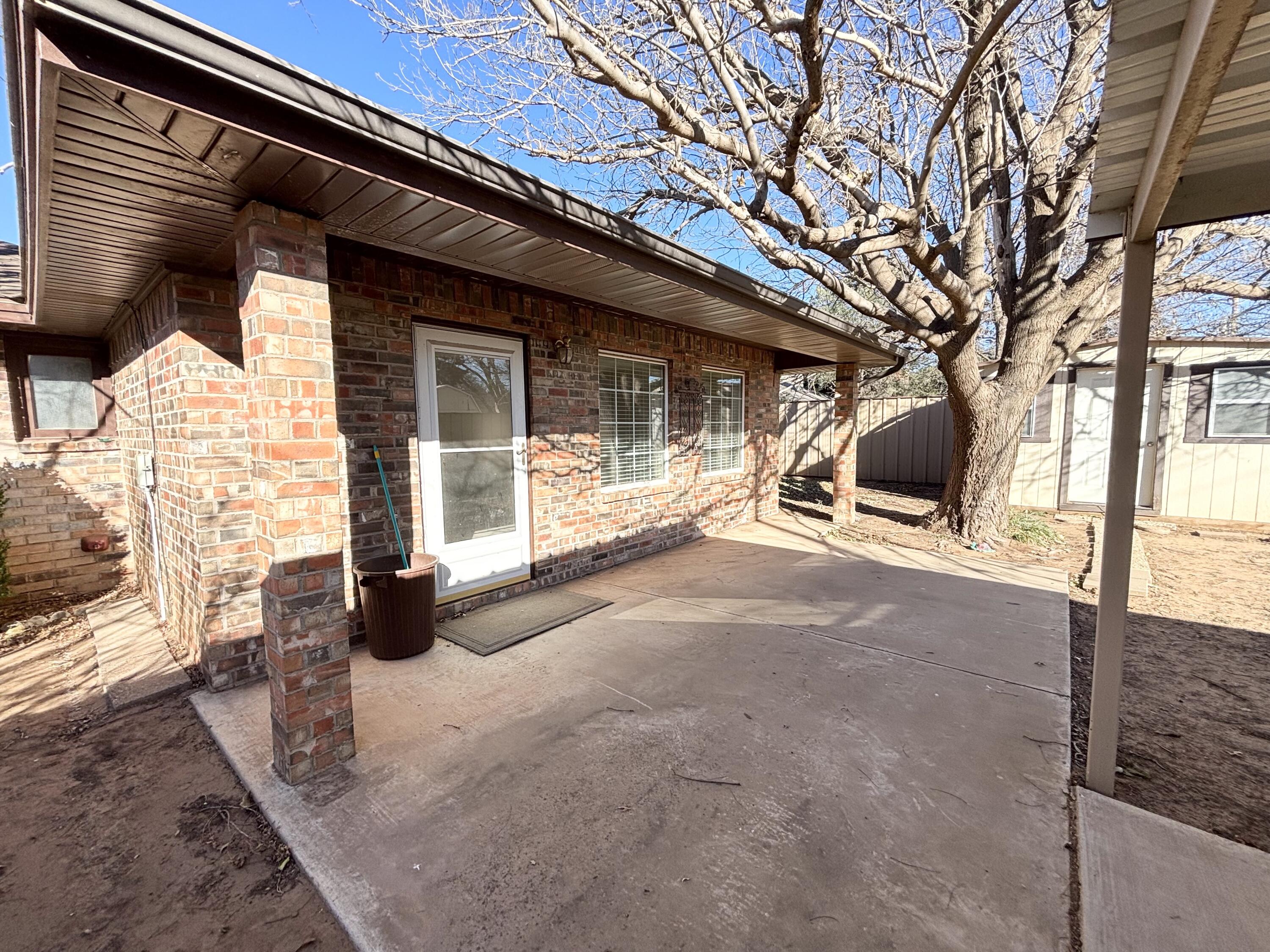 4913 62nd Street Lubbock, TX 79414 - Photo 19 of 22 a view of a house with a patio