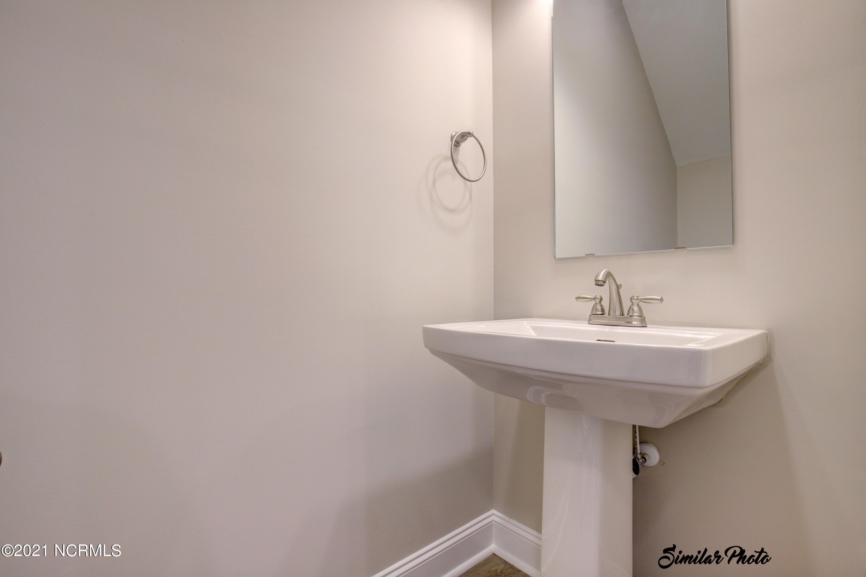 347 South Stingray Lane Holly Ridge, NC 28445 - Photo 13 of 31 12 - Half Bath (interior)
