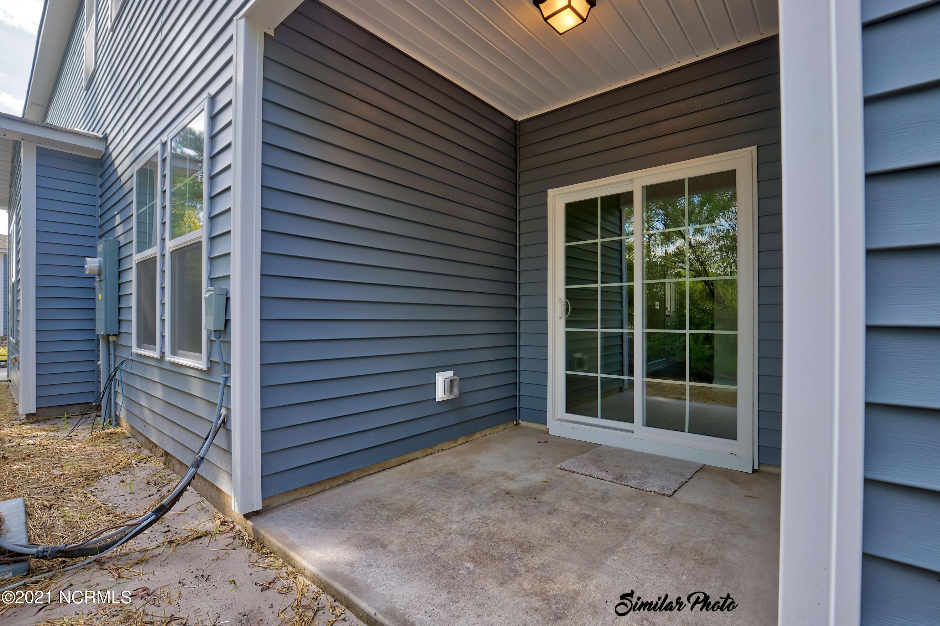 347 South Stingray Lane Holly Ridge, NC 28445 - Photo 15 of 31 14 - Covered Porch (interior)