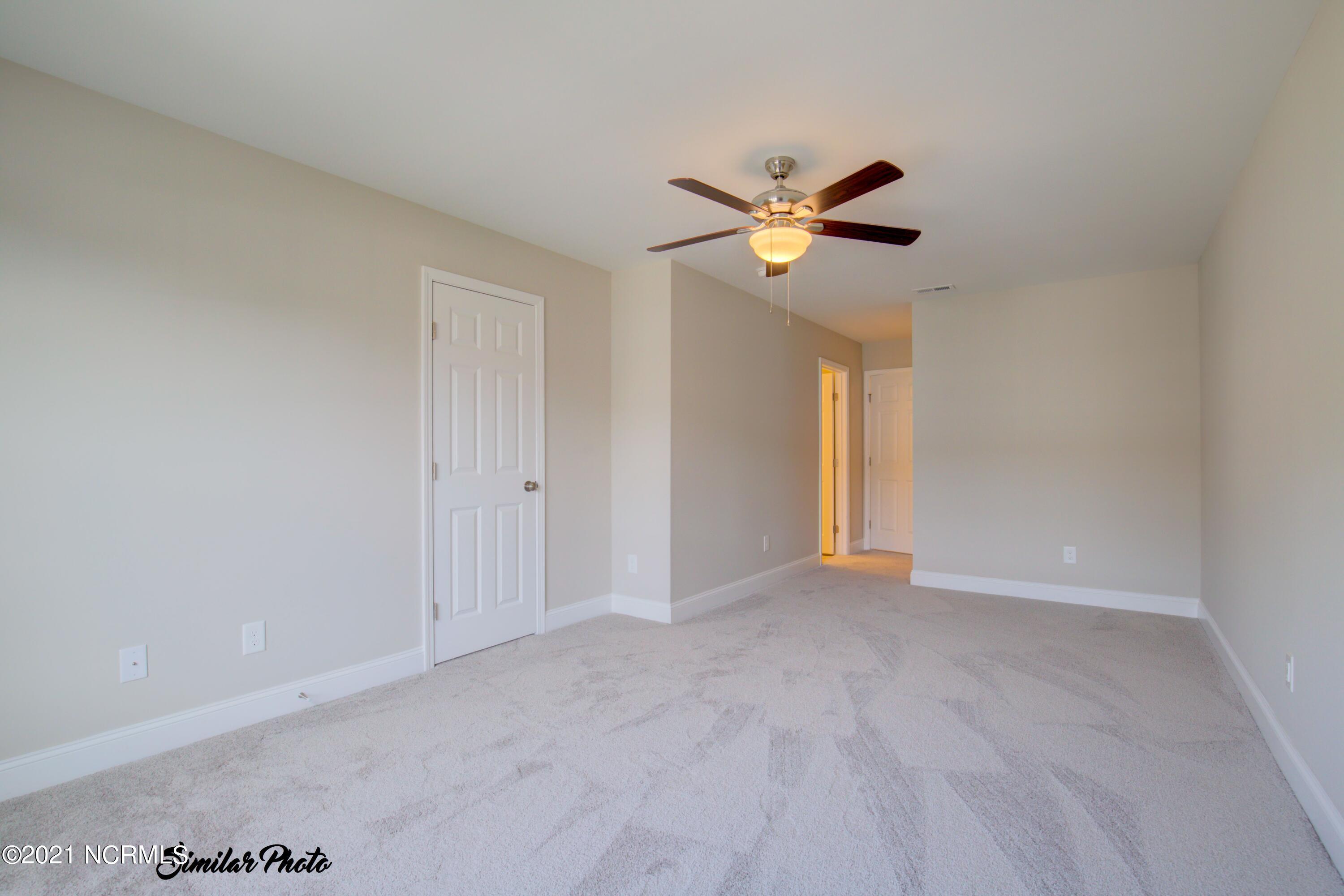 347 South Stingray Lane Holly Ridge, NC 28445 - Photo 18 of 31 17 - Master Bed (interior)