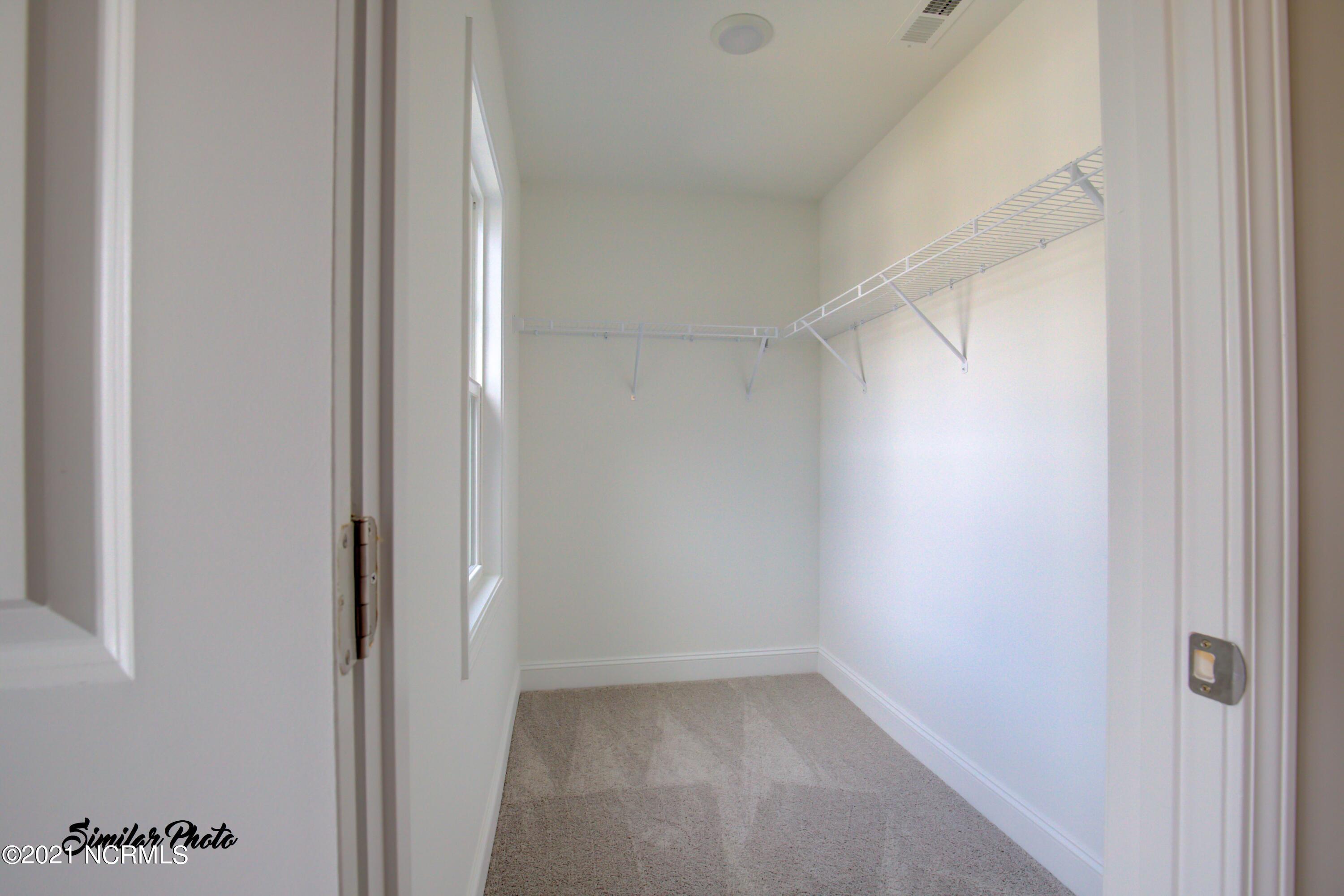 347 South Stingray Lane Holly Ridge, NC 28445 - Photo 20 of 31 19 - Master Closet (interior)