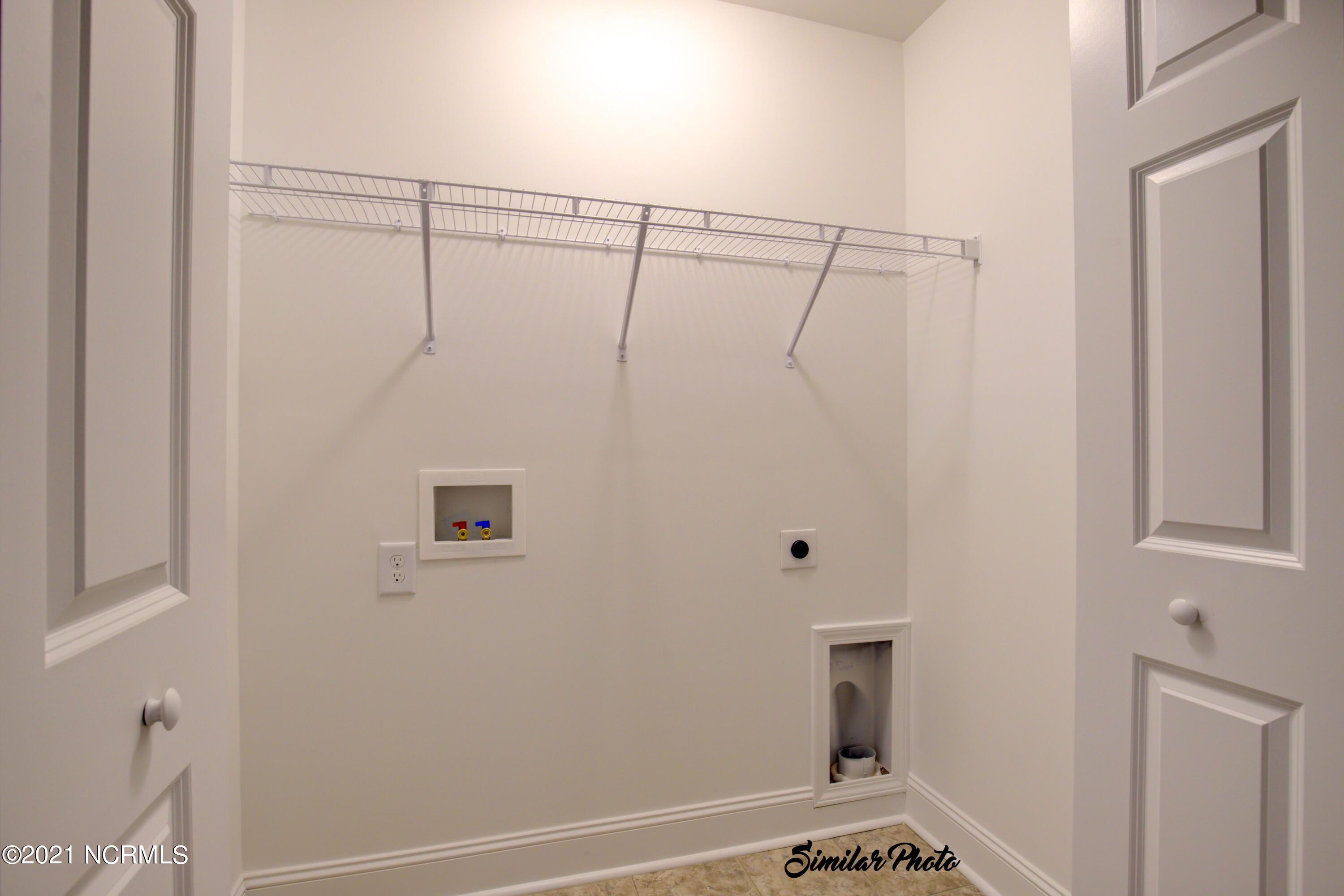 347 South Stingray Lane Holly Ridge, NC 28445 - Photo 24 of 31 23 - Laundry (interior)