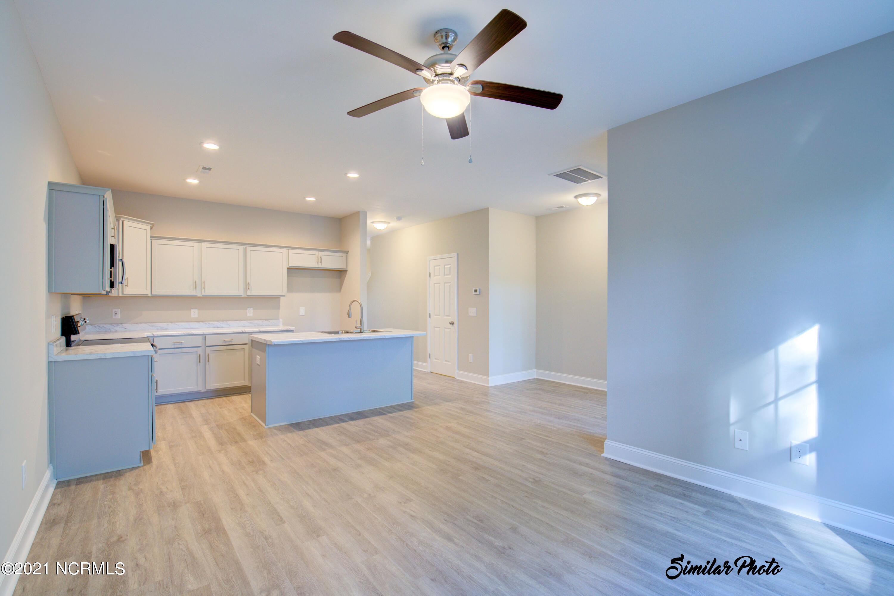 347 South Stingray Lane Holly Ridge, NC 28445 - Photo 10 of 31 9 - Living, Kitchen, Dining (interior)