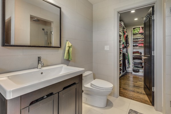 45 Vinton Street, Unit 5 Boston, MA 02127 - Photo 10 of 14 a bathroom with a sink a toilet and shower