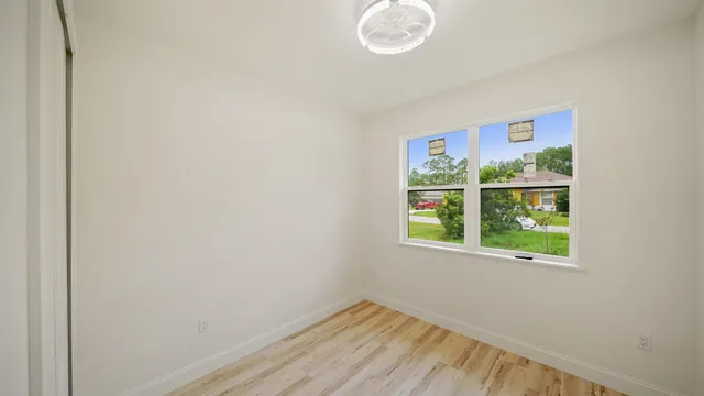 a view of a room that has a window in it