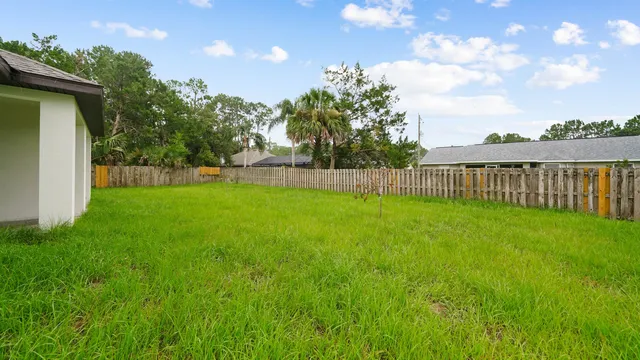 a view of a backyard with a garden