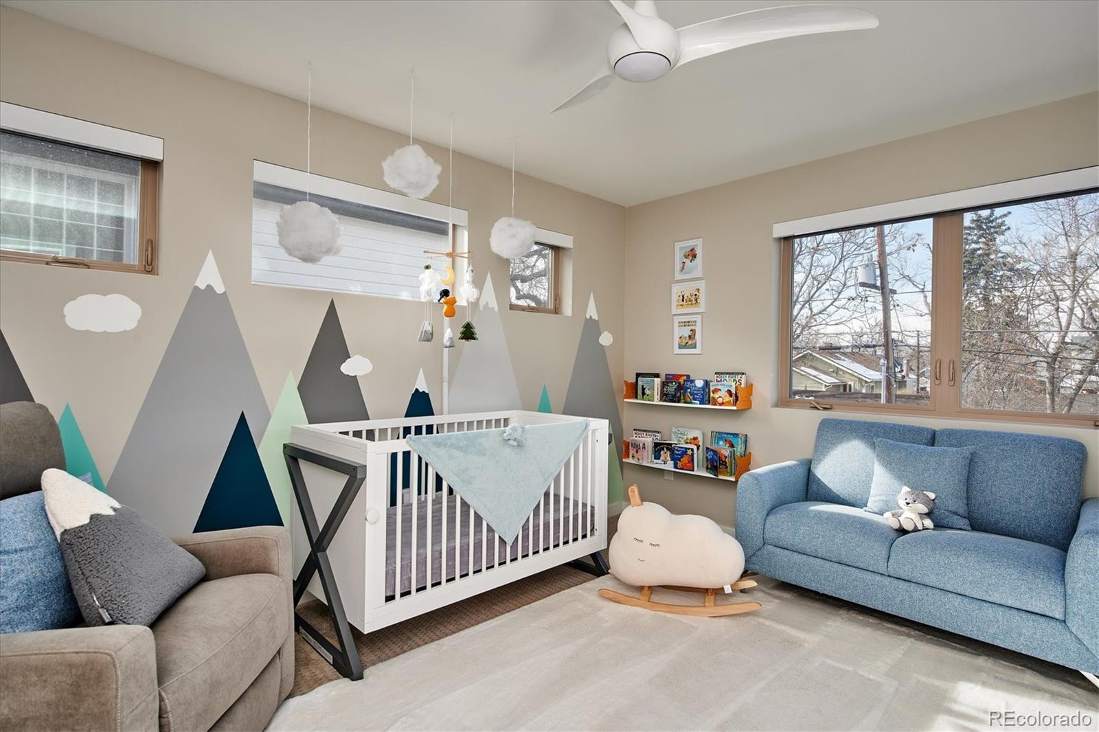 4583 Utica Street Denver, CO 80212 - Photo 21 of 40 a living room with furniture and a large window