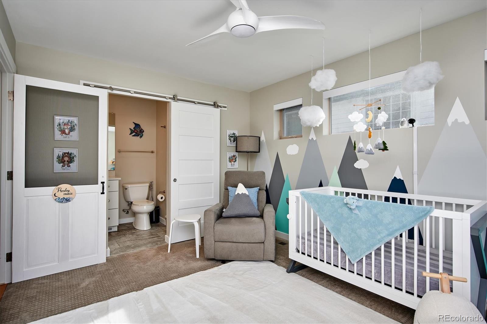 4583 Utica Street Denver, CO 80212 - Photo 22 of 40 a bedroom with furniture and wooden floor