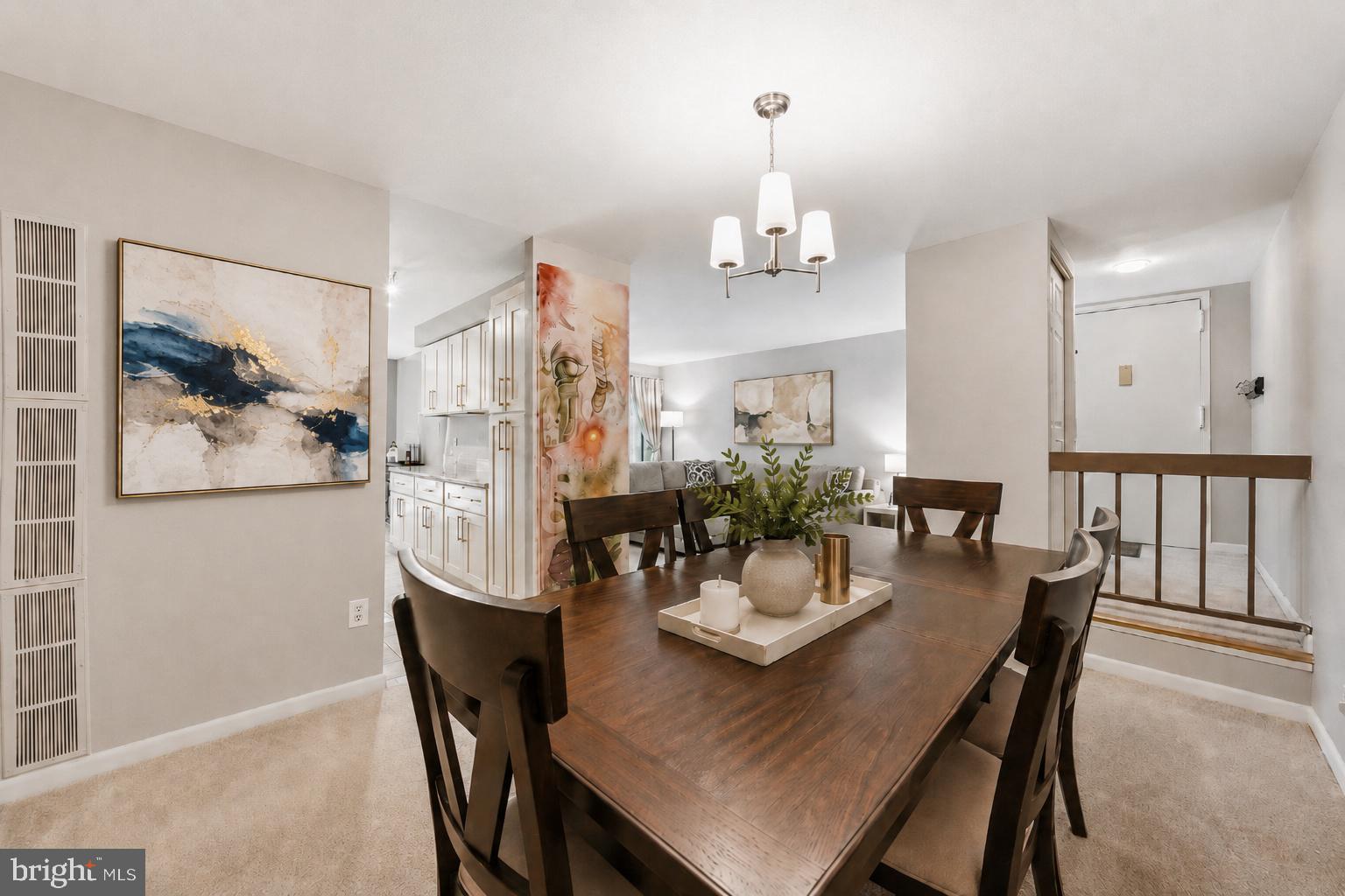 11252 Chestnut Grove Square, Unit 248 Reston, VA 20190 - Photo 5 of 25 Inviting dining space with modern flair.