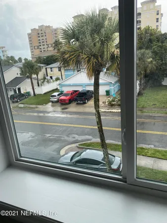 a view of swimming pool from a window
