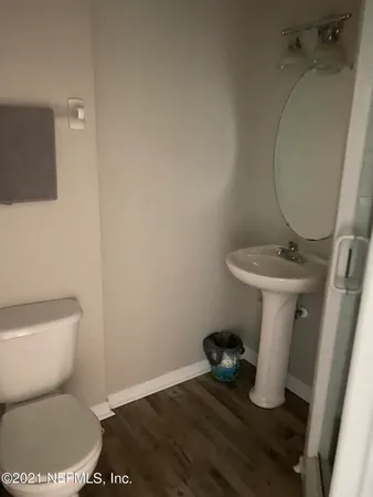 a bathroom with a toilet and a sink