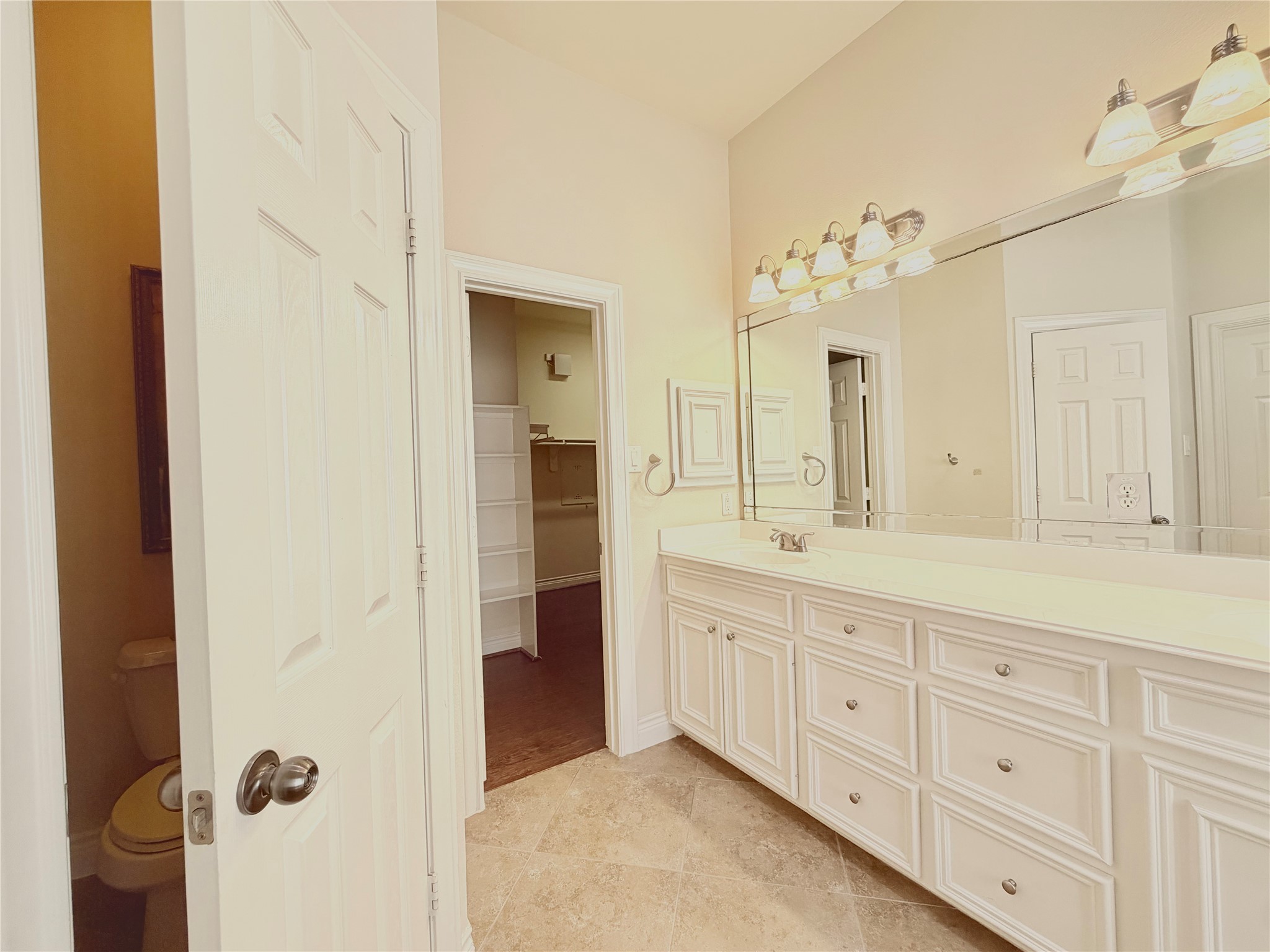 22015 Rustic Canyon Lane Richmond, TX 77469 - Photo 18 of 26 a spacious bathroom with a granite countertop sink a mirror and a shower