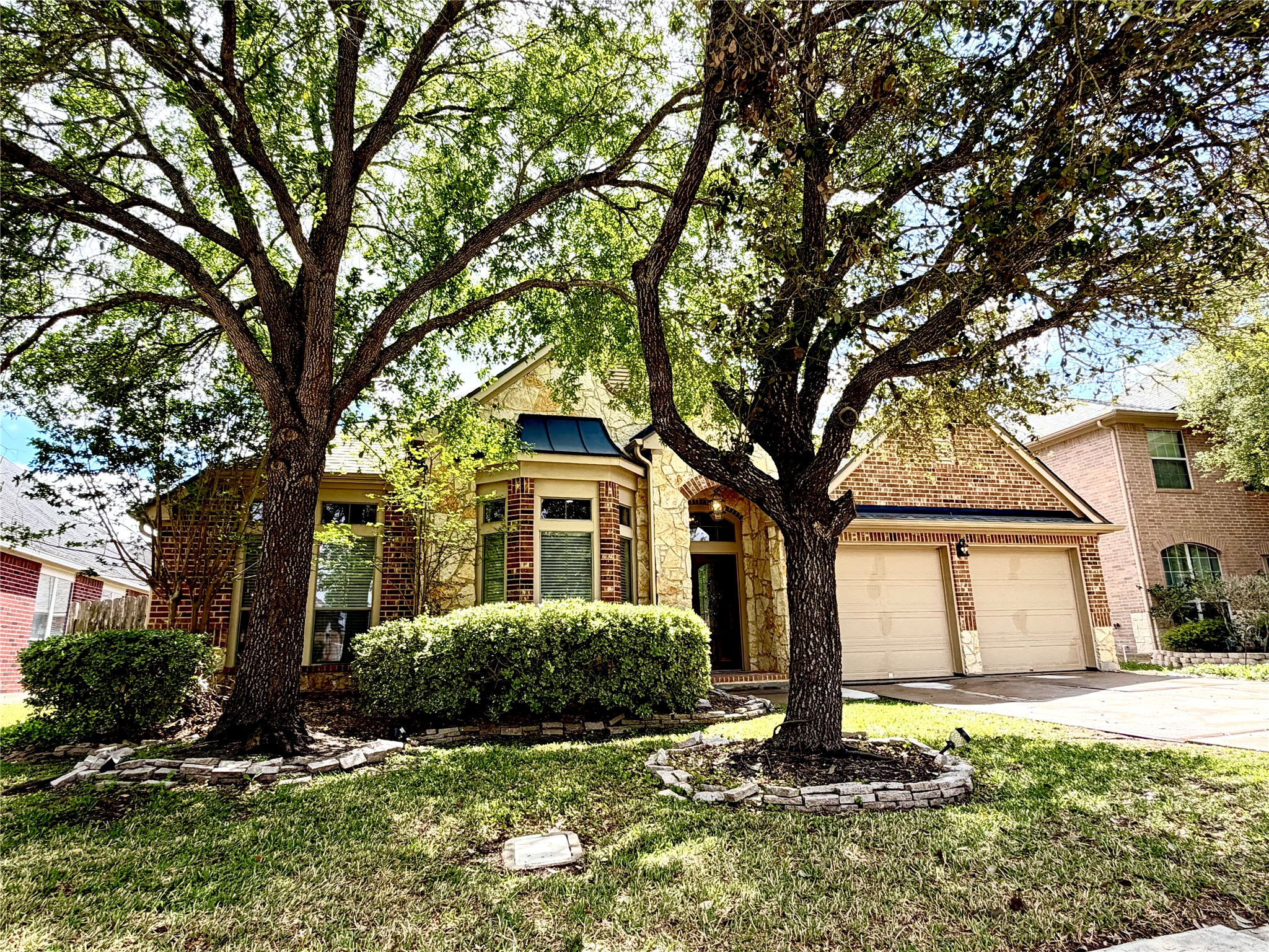 22015 Rustic Canyon Lane Richmond, TX 77469 - Photo 2 of 26 a front view of a house with a yard