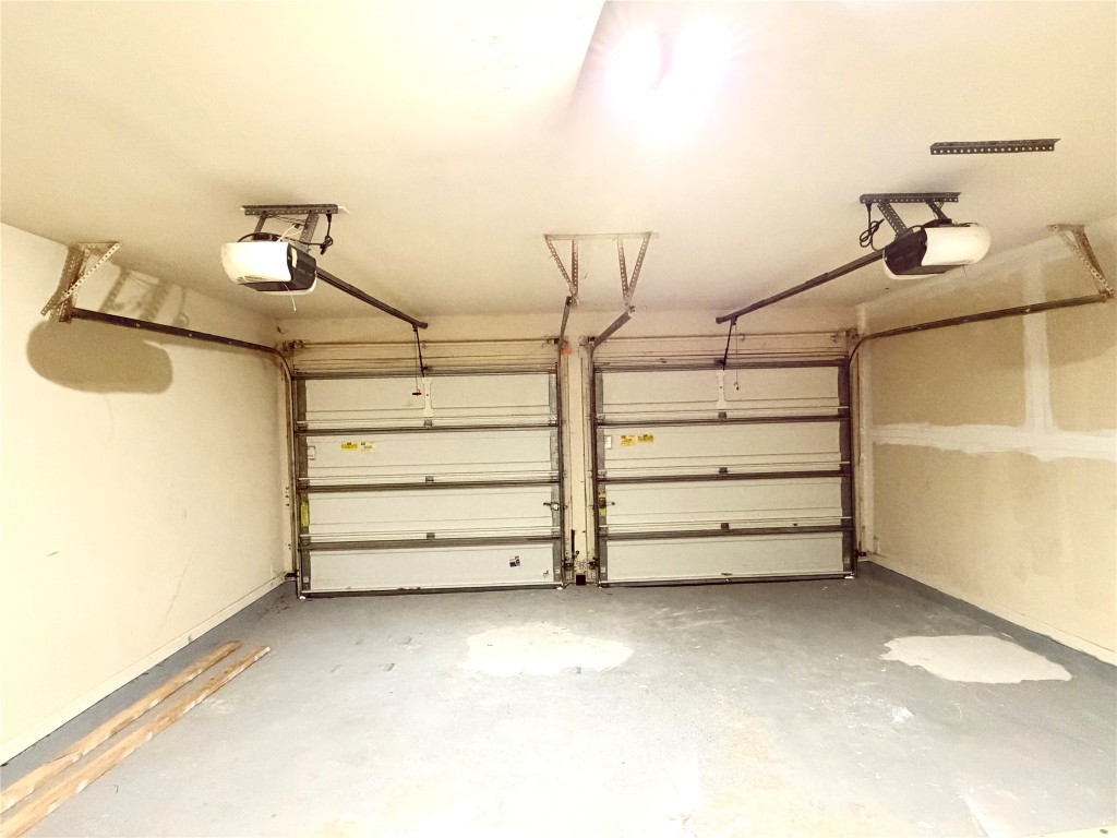 22015 Rustic Canyon Lane Richmond, TX 77469 - Photo 25 of 26 a view of room and garage