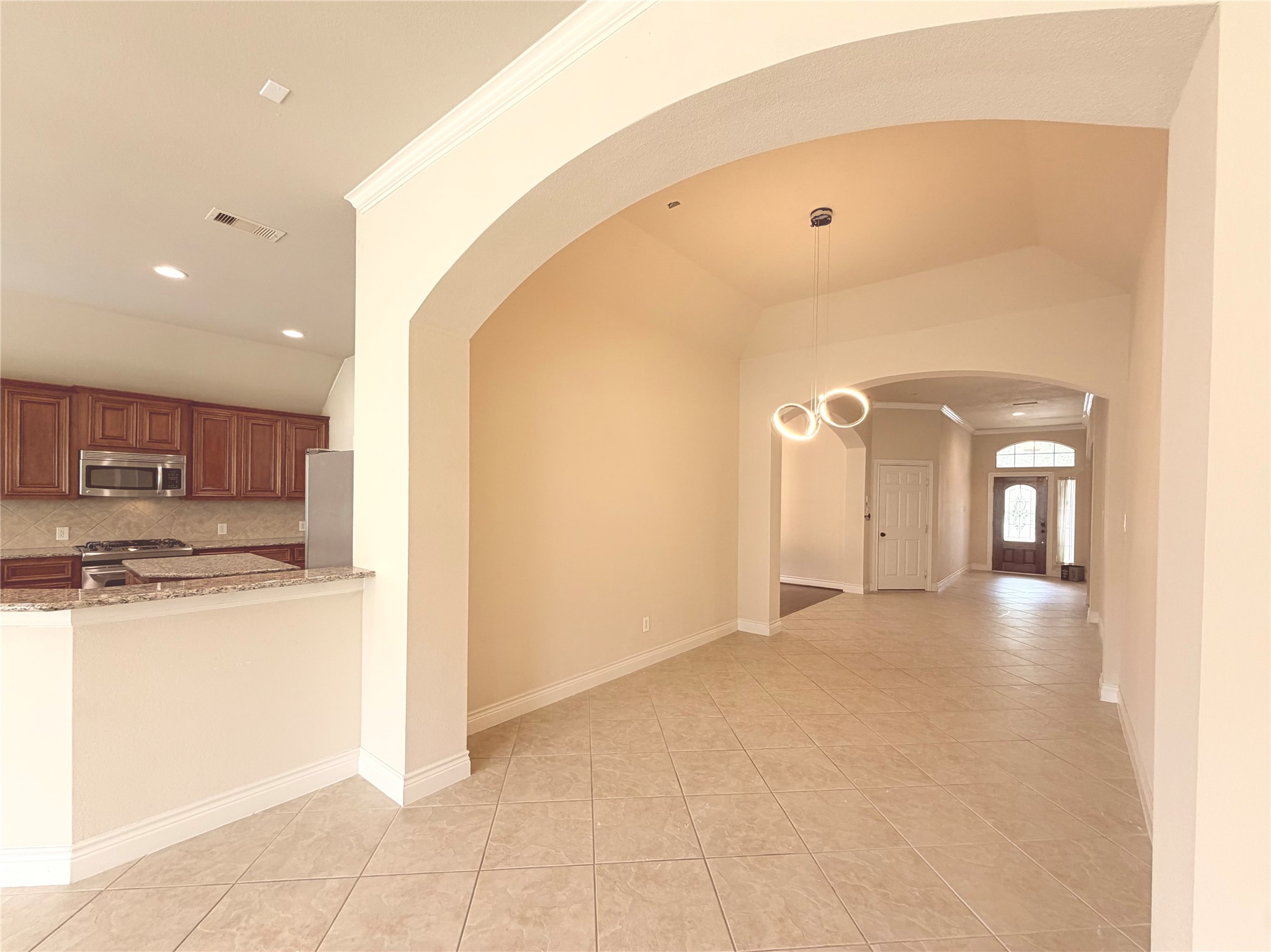 22015 Rustic Canyon Lane Richmond, TX 77469 - Photo 9 of 26 a view of a kitchen with a sink