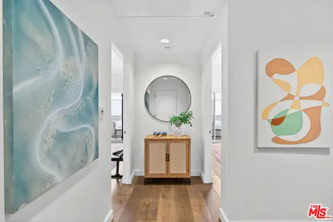 a bathroom with a mirror and a shower