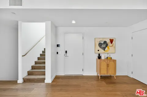 a view of an entryway with staircase