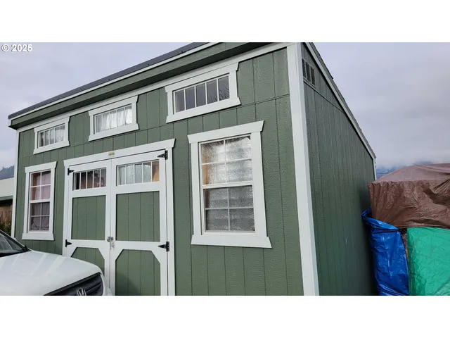 a black and white photo of a house