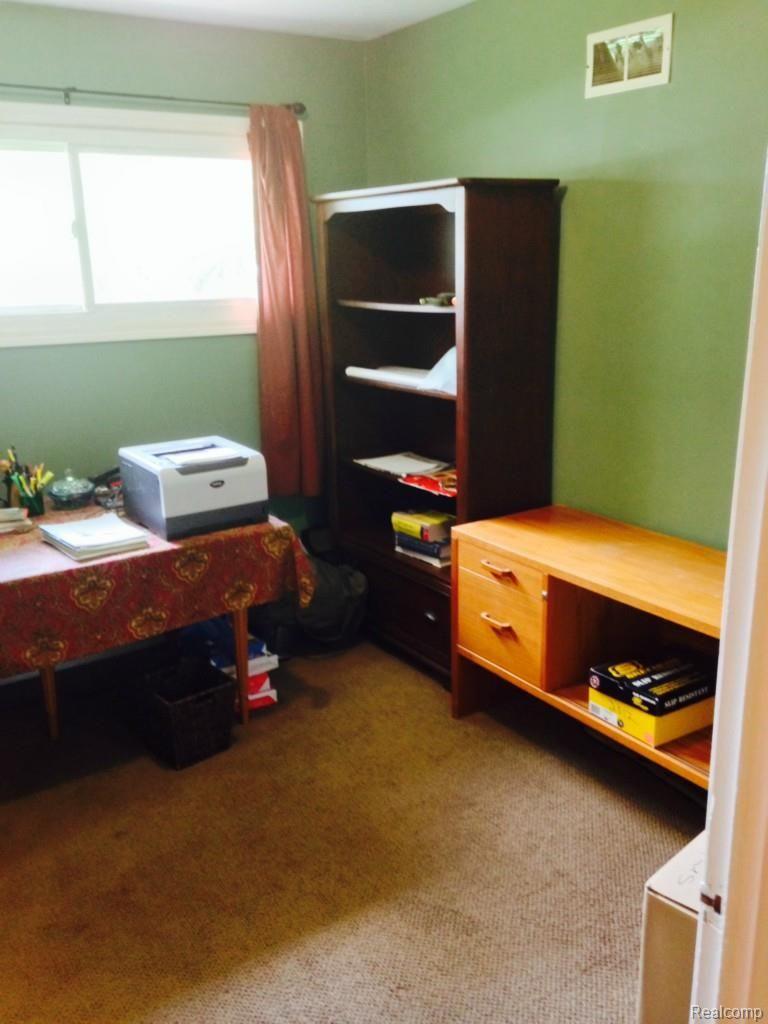 7910 Dubuque Road Clarkston, MI 48348 - Photo 2 of 17 THIRD BEDROOM USED AS OFFICE