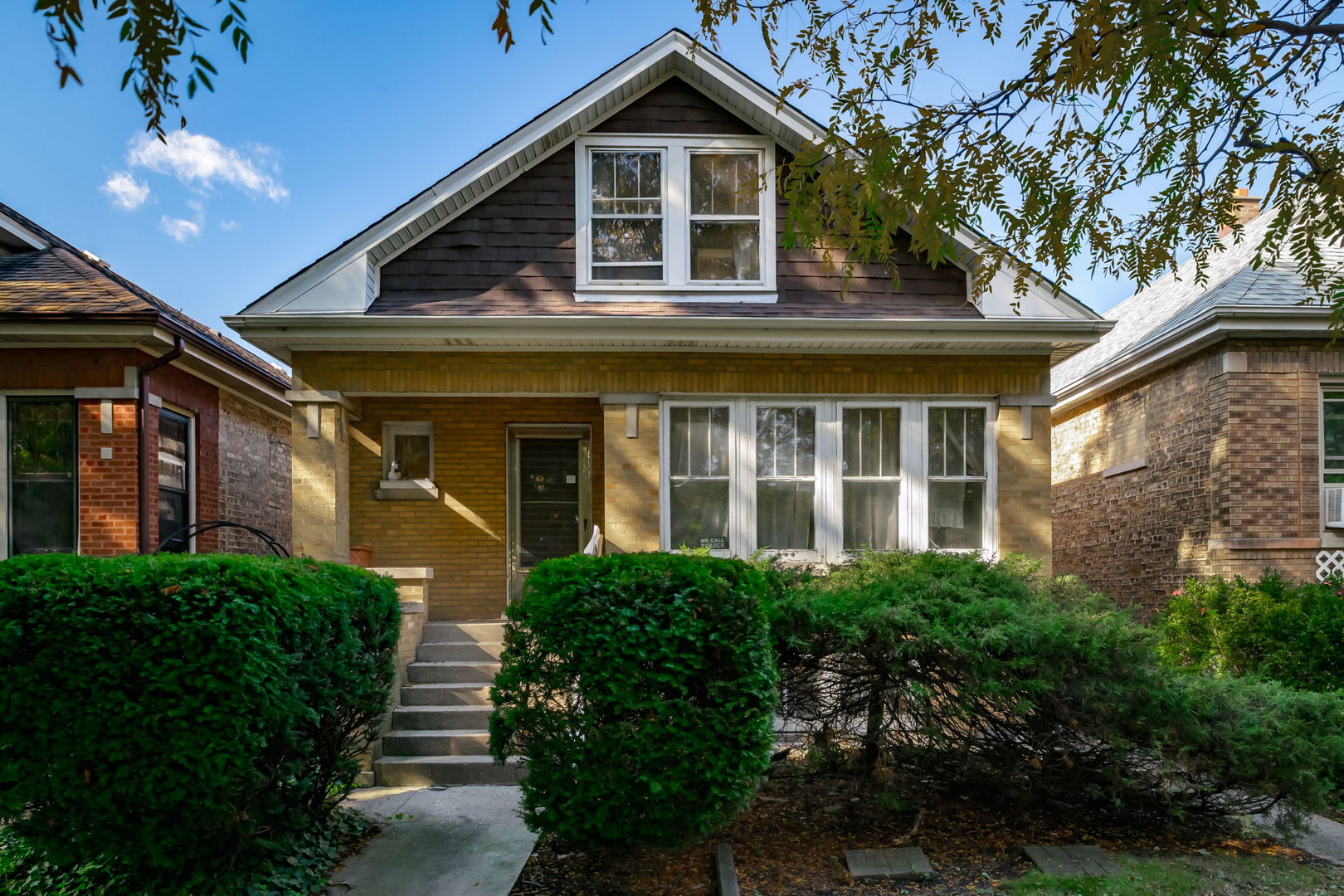 4648 North Lawler Avenue Chicago, IL 60630 - Photo 1 of 23 a front view of a house with a yard