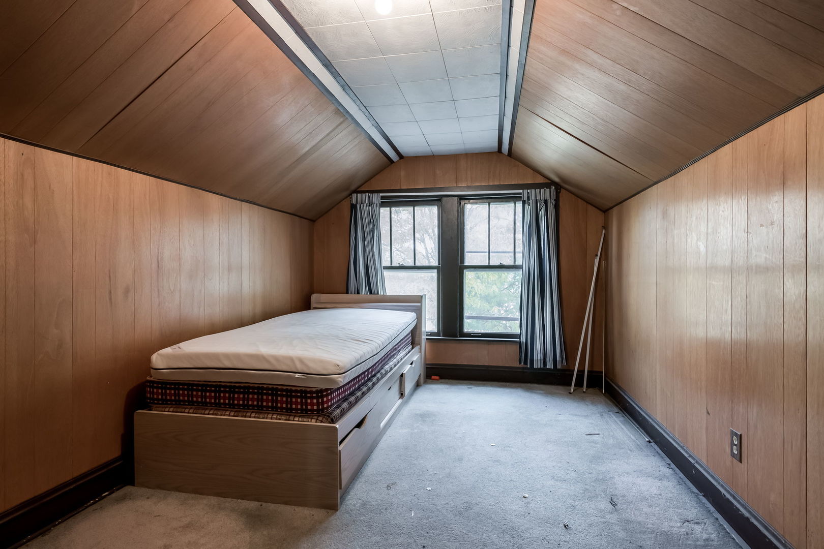 4648 North Lawler Avenue Chicago, IL 60630 - Photo 15 of 23 a room with a bed and a window