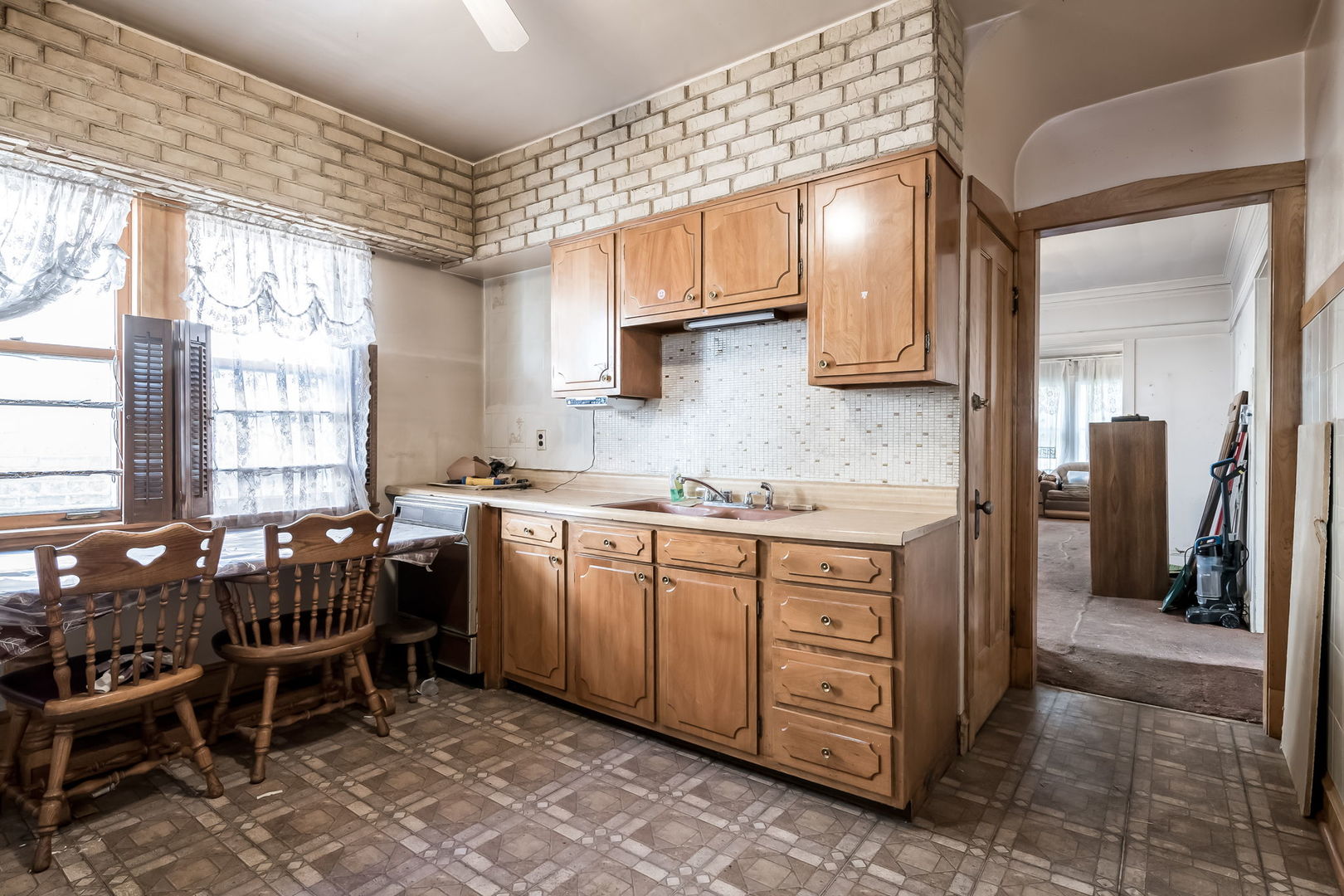 4648 North Lawler Avenue Chicago, IL 60630 - Photo 10 of 23 a kitchen with a sink and cabinets
