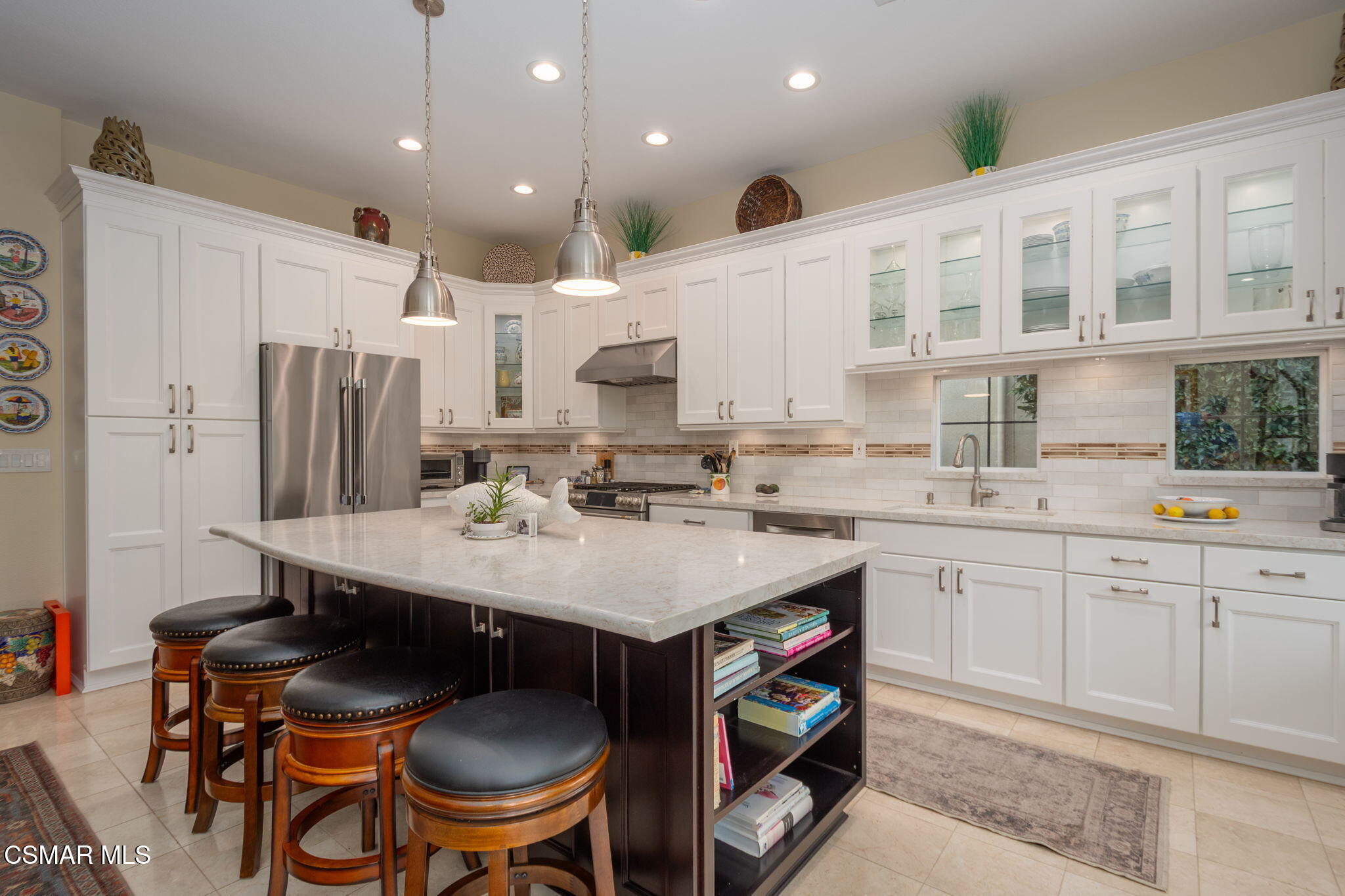 1126 Corte Riviera Camarillo, CA 93010 - Photo 12 of 36 a kitchen with stainless steel appliances granite countertop a sink a stove a refrigerator and cabinets