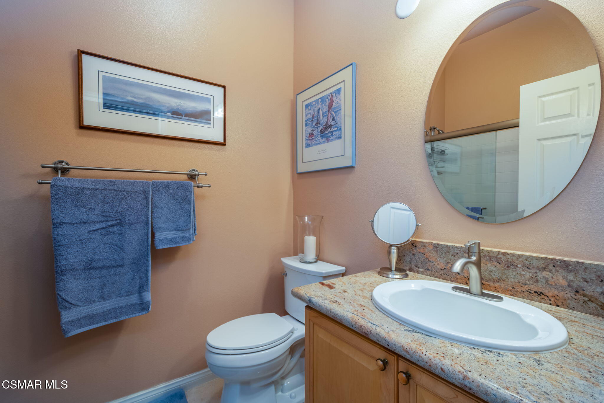 1126 Corte Riviera Camarillo, CA 93010 - Photo 21 of 36 a bathroom with a granite countertop toilet a sink and a mirror