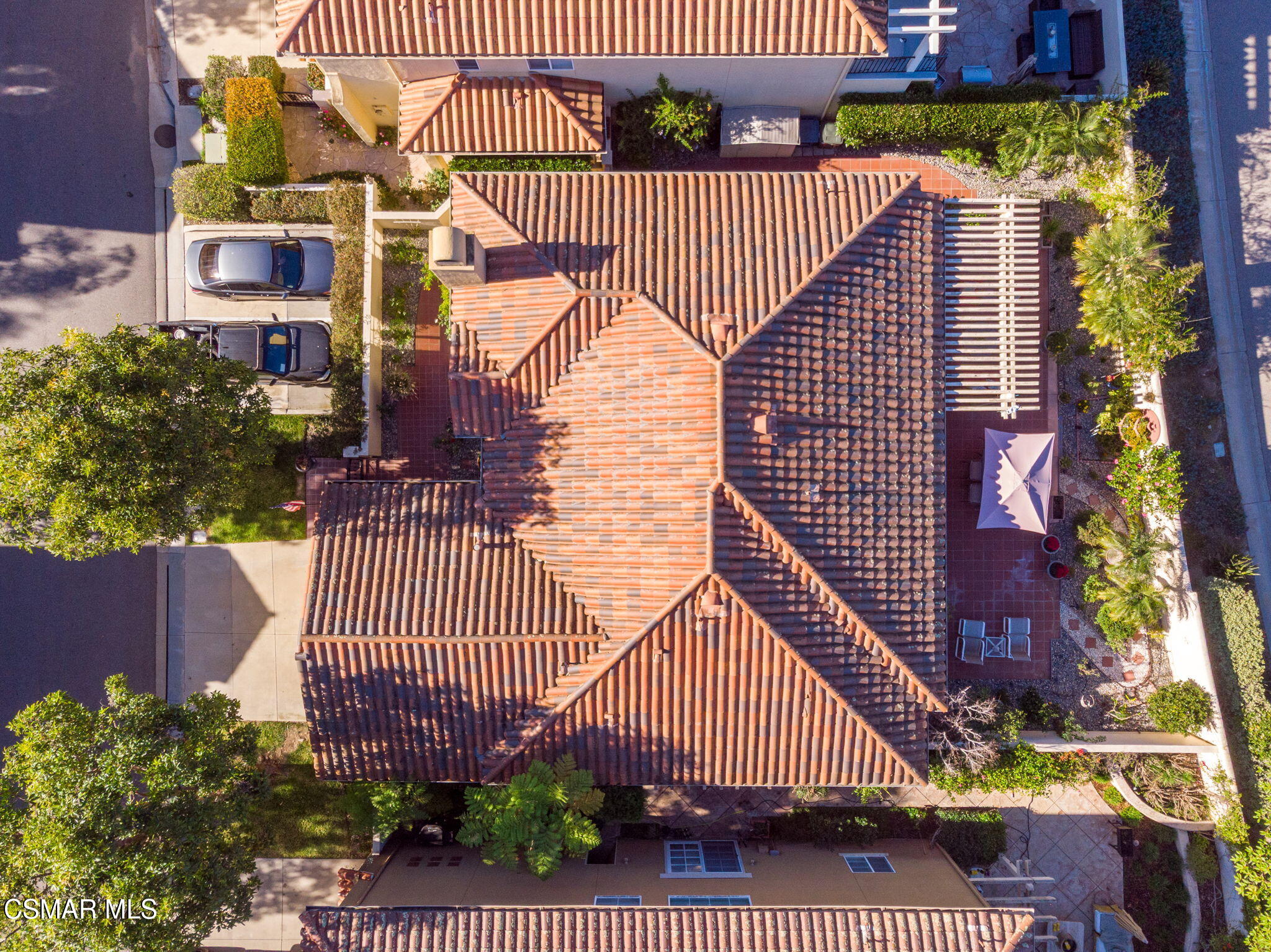 1126 Corte Riviera Camarillo, CA 93010 - Photo 6 of 36 front view of a house with a garden