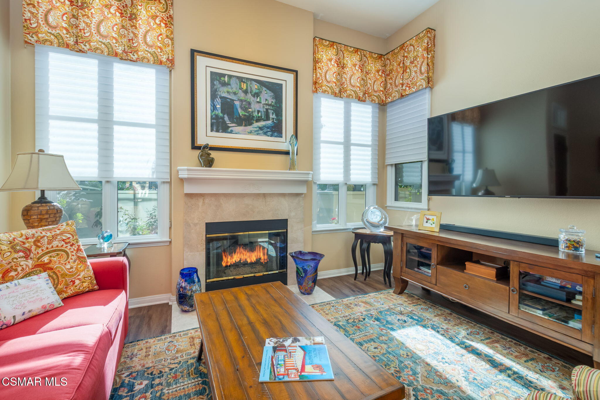 1126 Corte Riviera Camarillo, CA 93010 - Photo 7 of 36 a living room with furniture and a fireplace