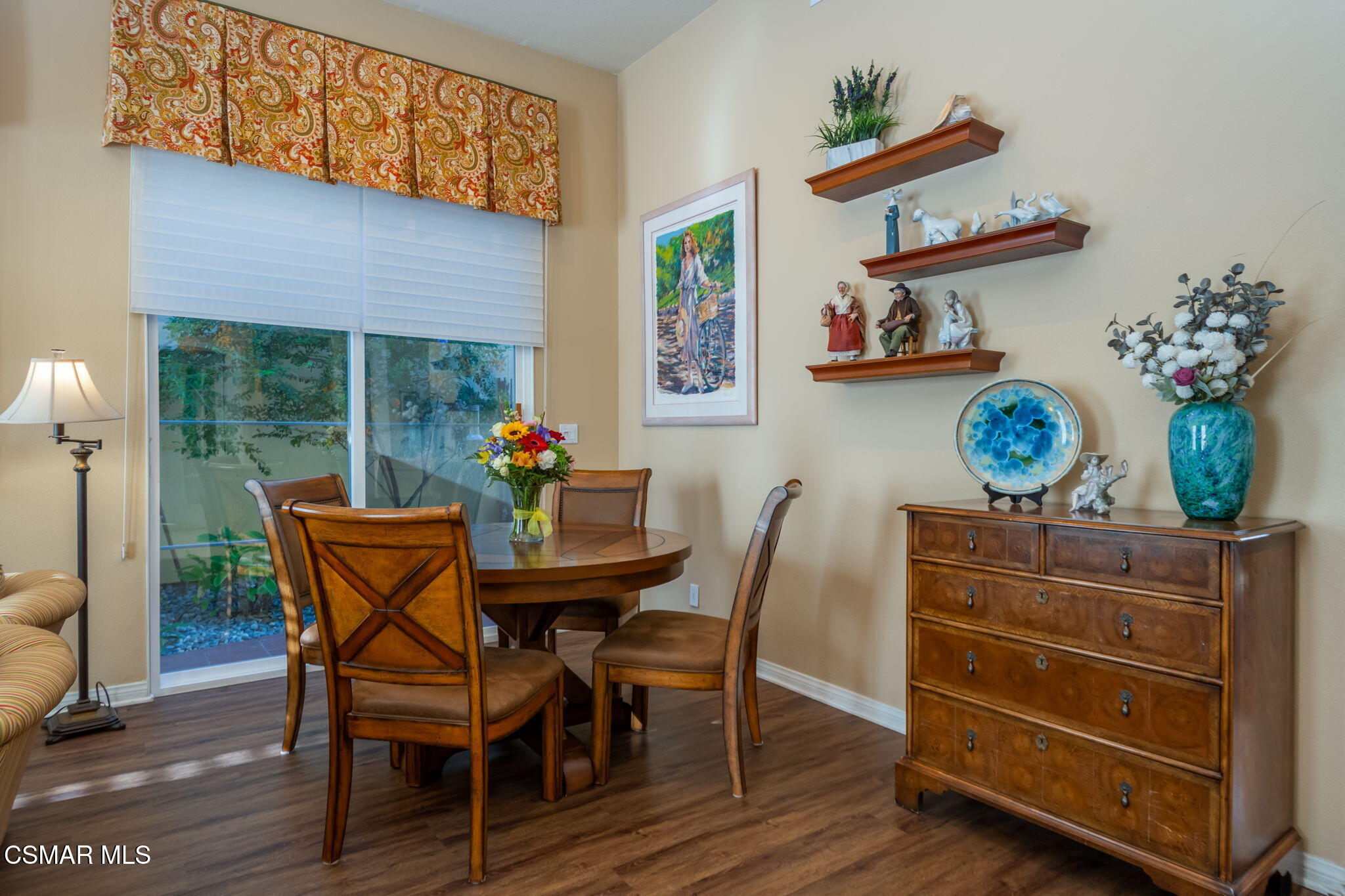 1126 Corte Riviera Camarillo, CA 93010 - Photo 9 of 36 a view of a dining room with furniture and a potted plant