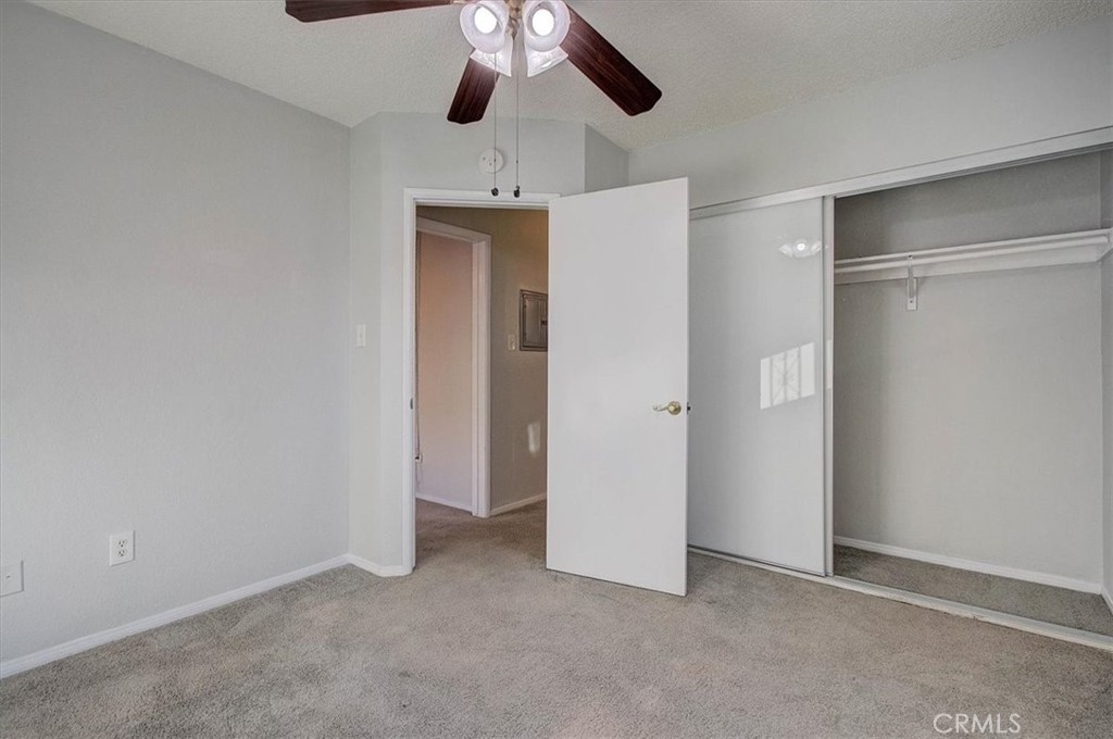 2122 East 10th Street Long Beach, CA 90804 - Photo 15 of 75 an empty room with a empty space and a ceiling fan