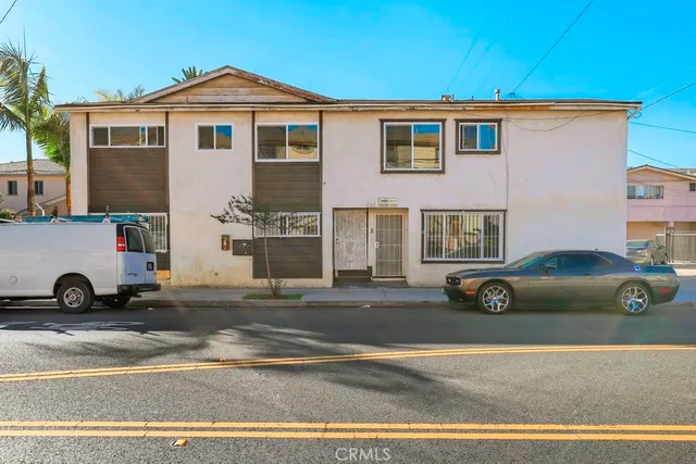 a kitchen with a sink cabinets and window