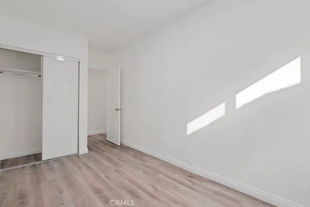 an aerial view of a house with a parking space