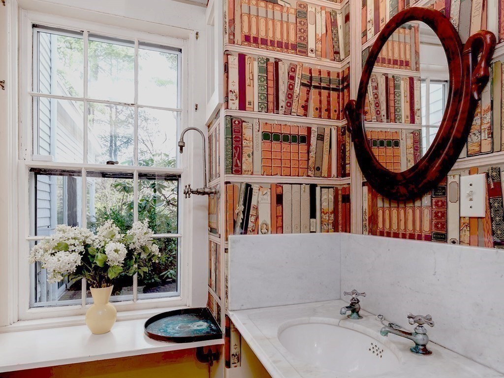 156 Larch Row Wenham, MA 01984 - Photo 18 of 38 a bathroom with a sink a mirror and a potted plant